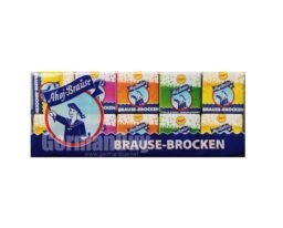 Colorful candy cubes of Frigeo Ahoj Brause Brocken Fizzy Candy in lemon, orange, raspberry, and woodruff flavors, displayed in bright, eye-catching packaging with the iconic Ahoj sailor logo – a traditional German fizzy sweet.