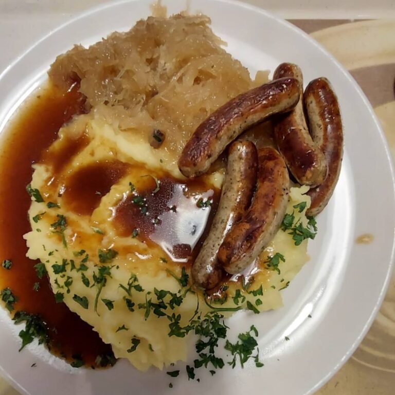 Nuremberg Sausages with Sauerkraut and Mashed Potatoes