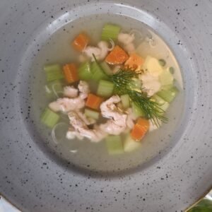Light and fresh salmon soup with vegetables and dill, northern German and Scandinavian style